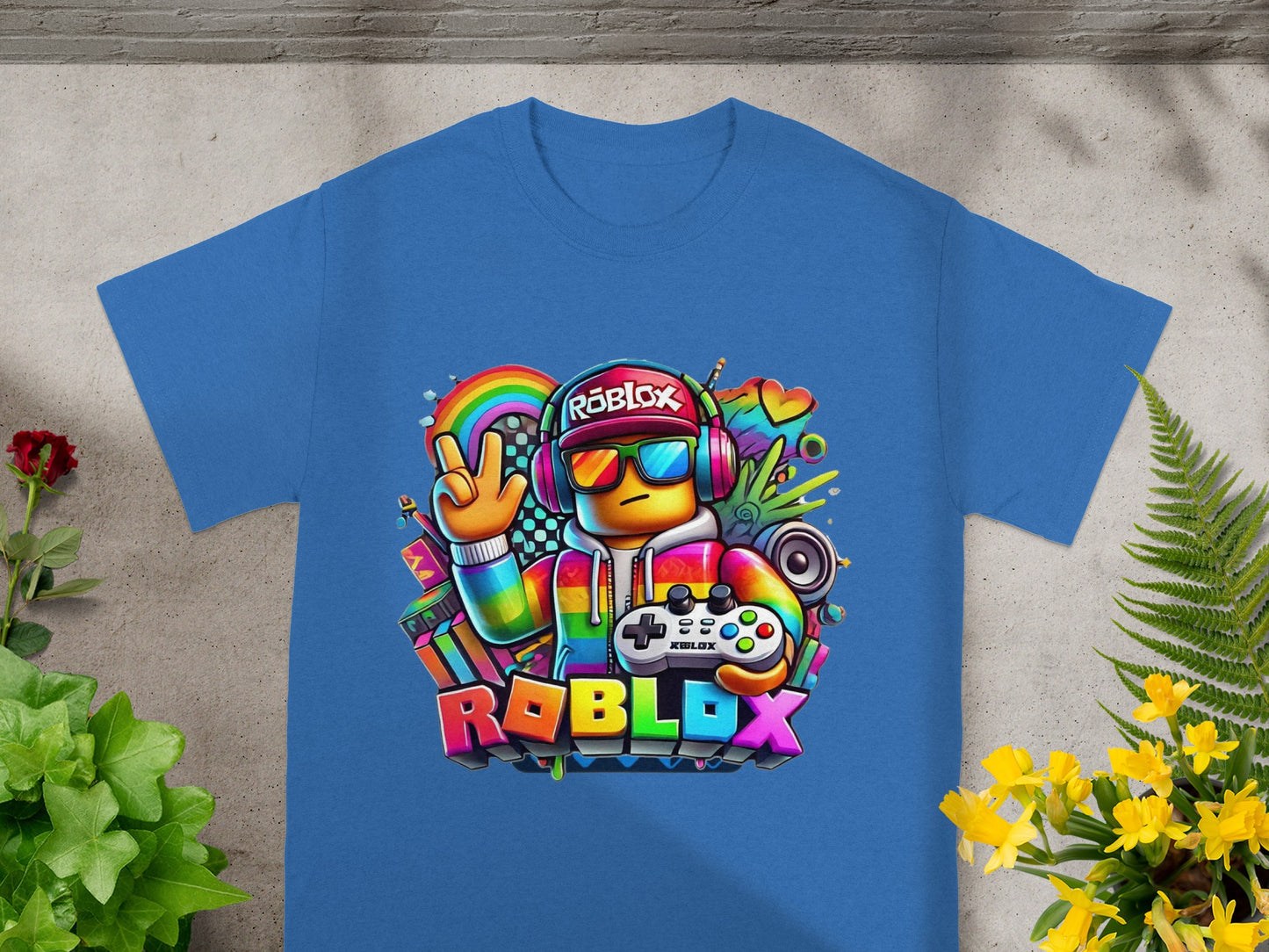 Roblox graphic t-shirt with colorful characters and rainbow accents.