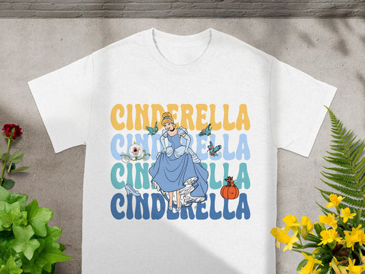 White t-shirt with Cinderella graphic and text.