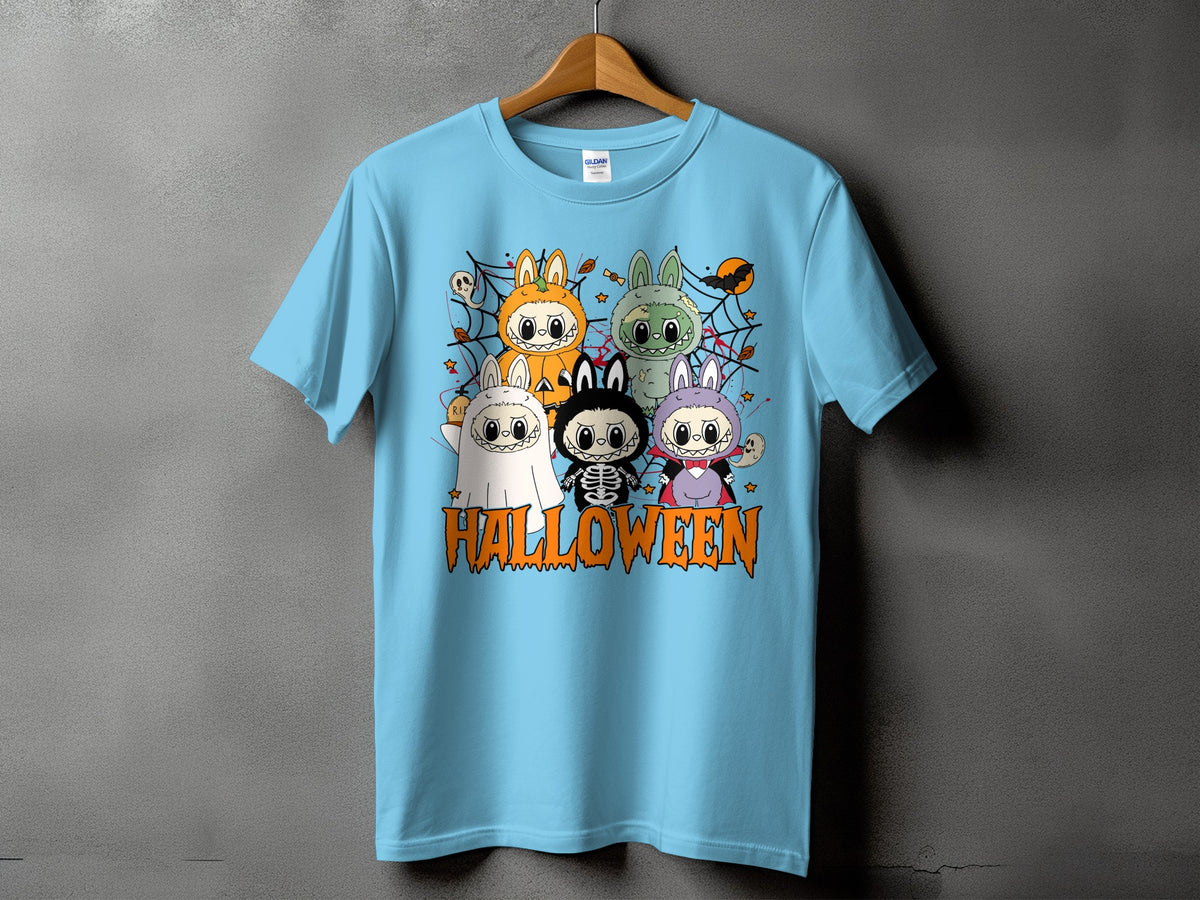 Light blue t-shirt with cartoon Halloween characters and the word "HALLOWEEN".