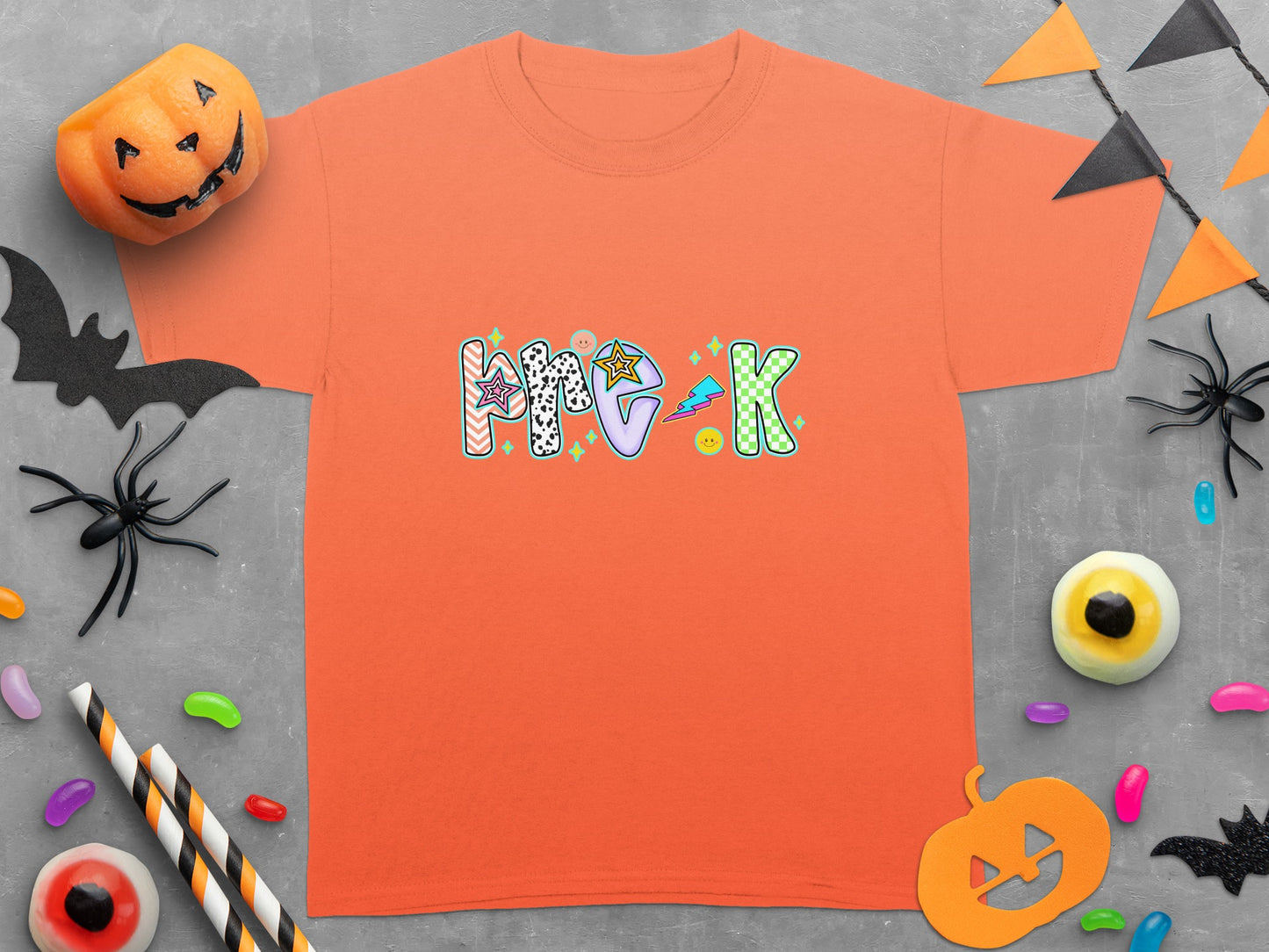 Orange t-shirt with "Pre-K" text and Halloween decorations.
