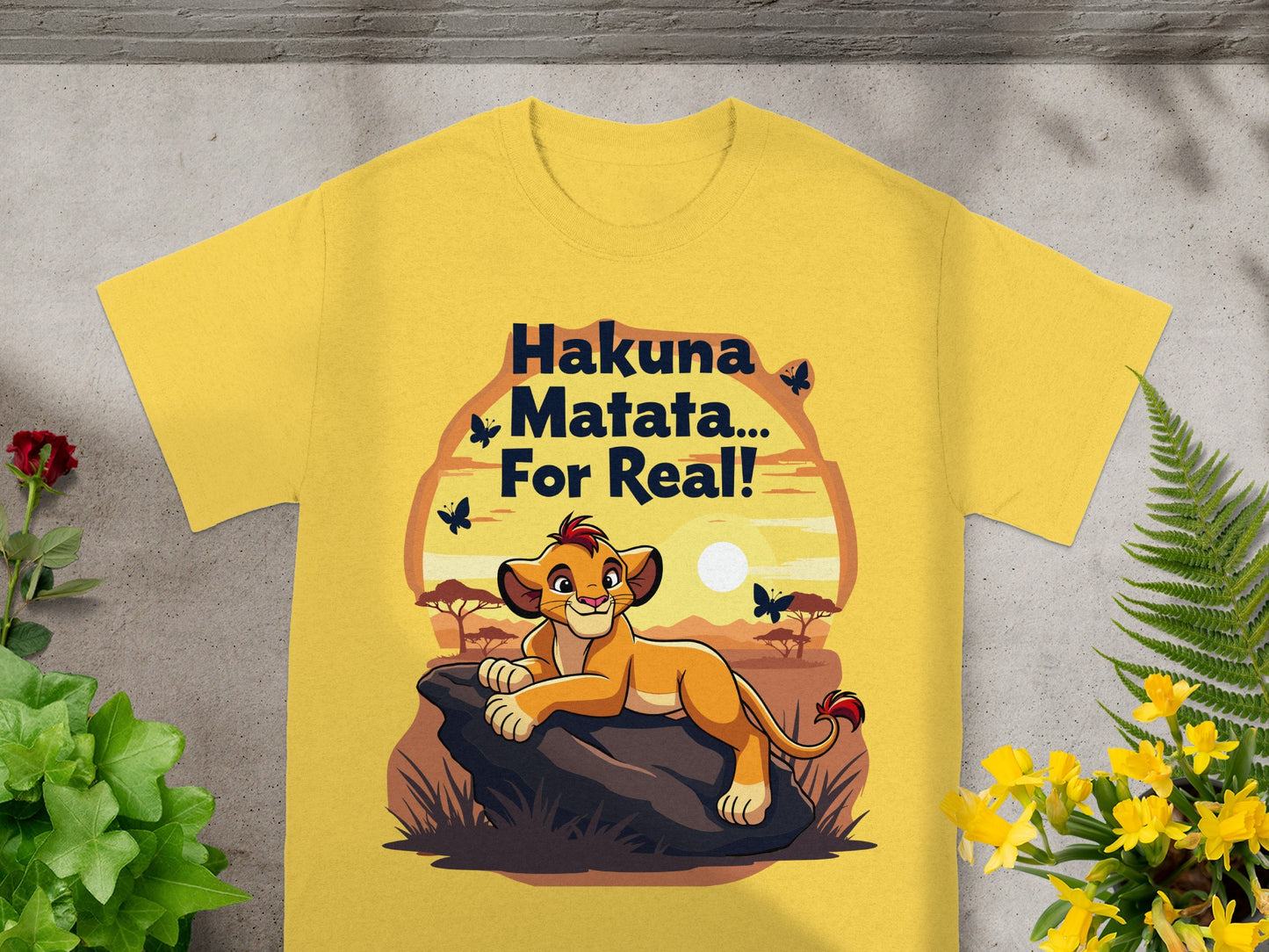 Yellow t-shirt with Simba from The Lion King saying "Hakuna Matata... For Real!".
