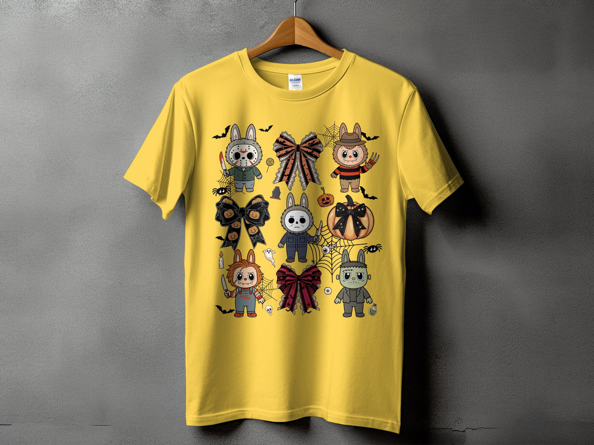 Yellow t-shirt with cartoon Halloween characters and bows.