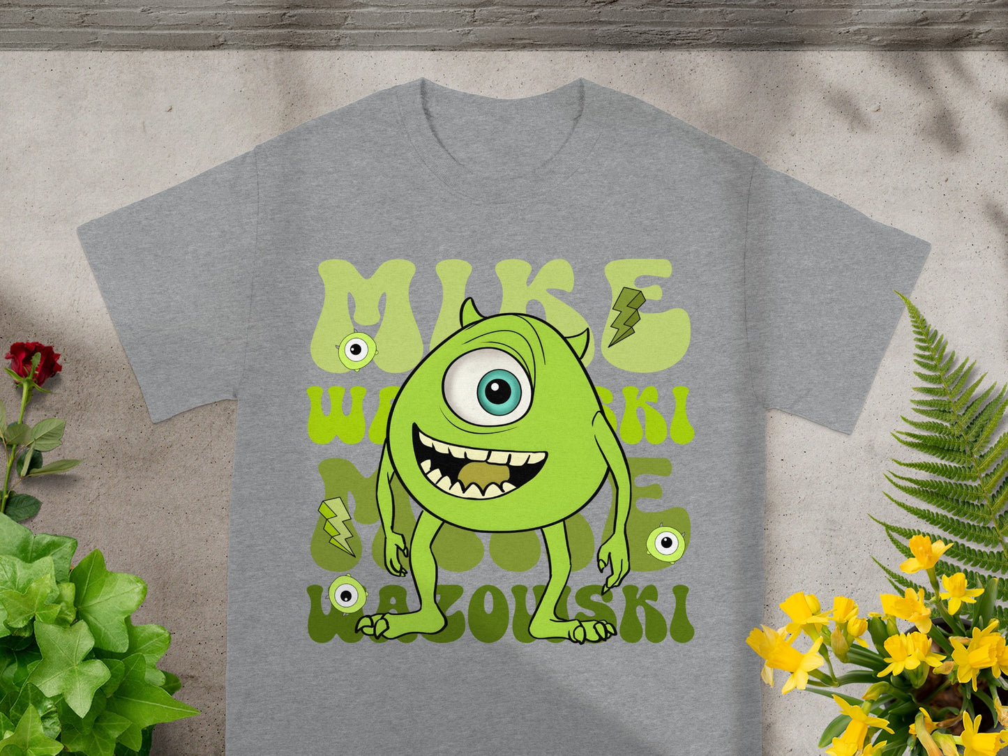 Mike Wazowski t-shirt with lightning bolts and green eyes.