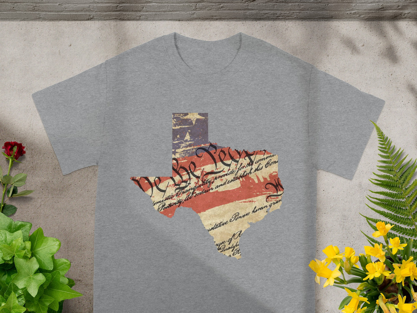 Grey t-shirt with Texas outline featuring US Constitution text and flag.