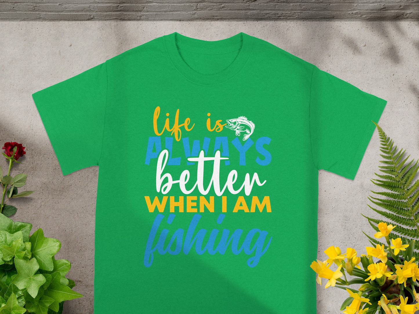 Green t-shirt with text "life is better when I am fishing".