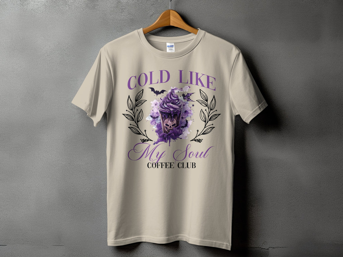 T-shirt with "COLD LIKE My Soul COFFEE CLUB" text and gothic coffee cup graphic.
