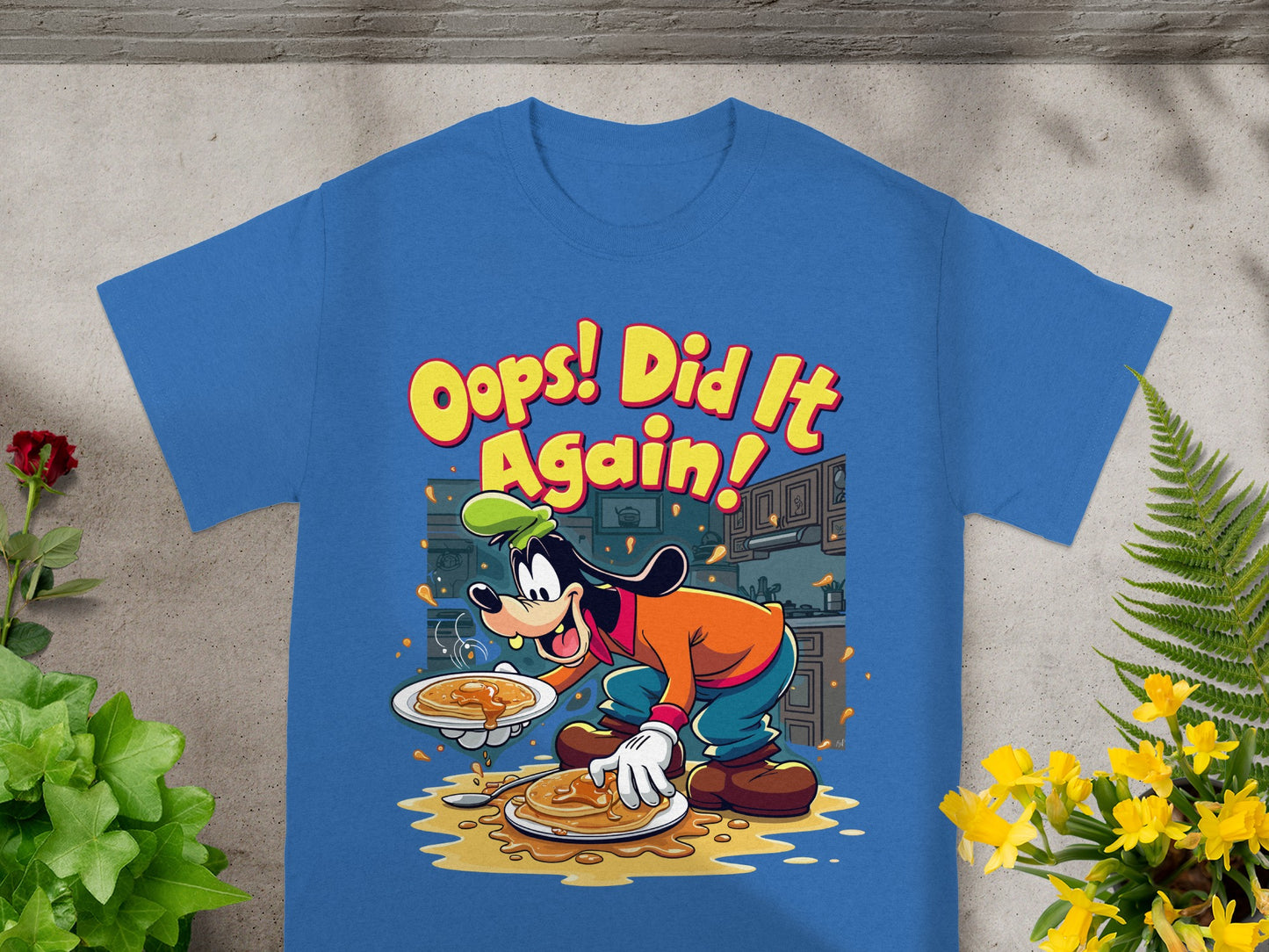 Blue t-shirt with Goofy character saying "Oops! Did It Again!".
