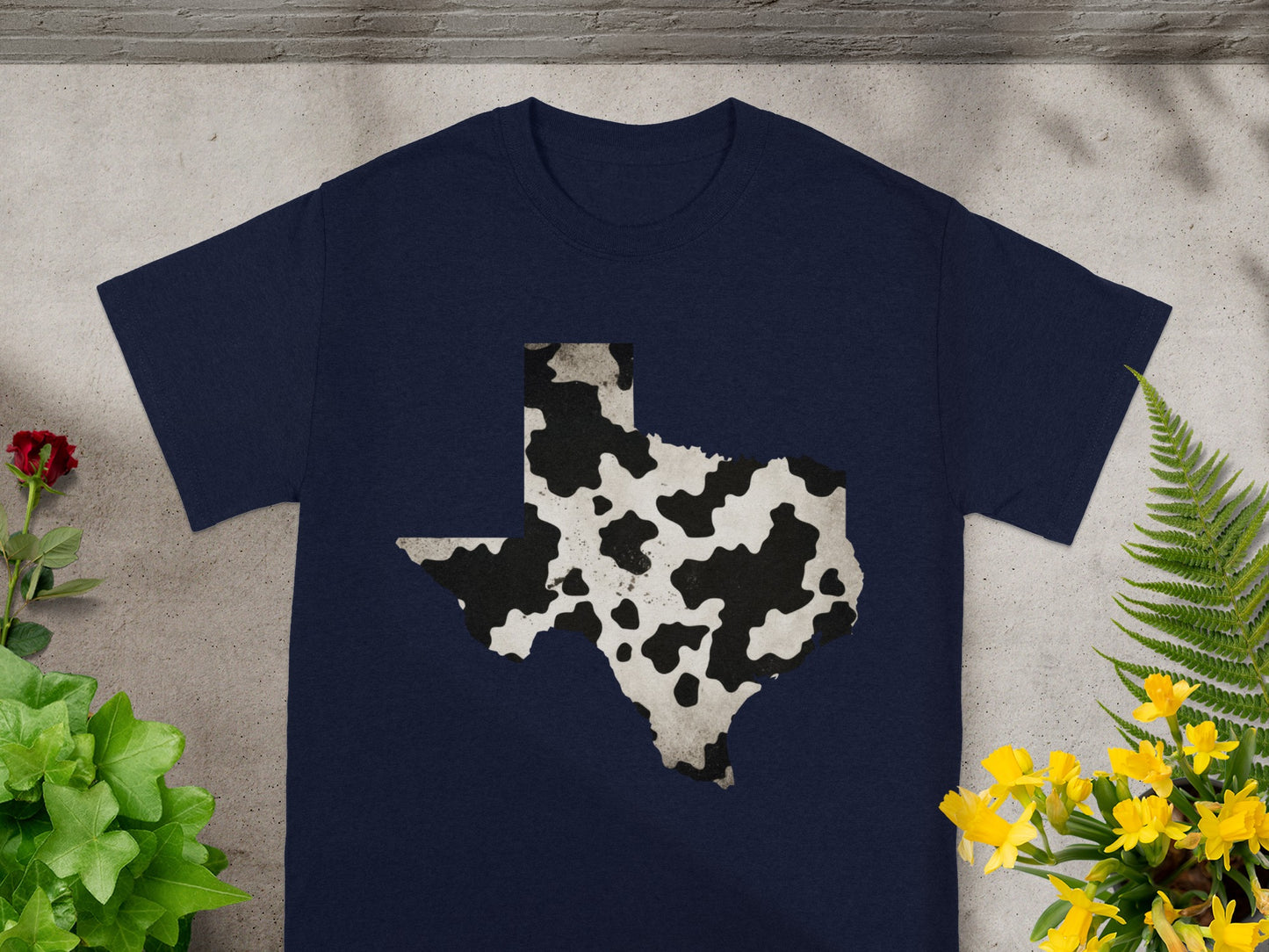Navy t-shirt with Texas map graphic in cowhide print.