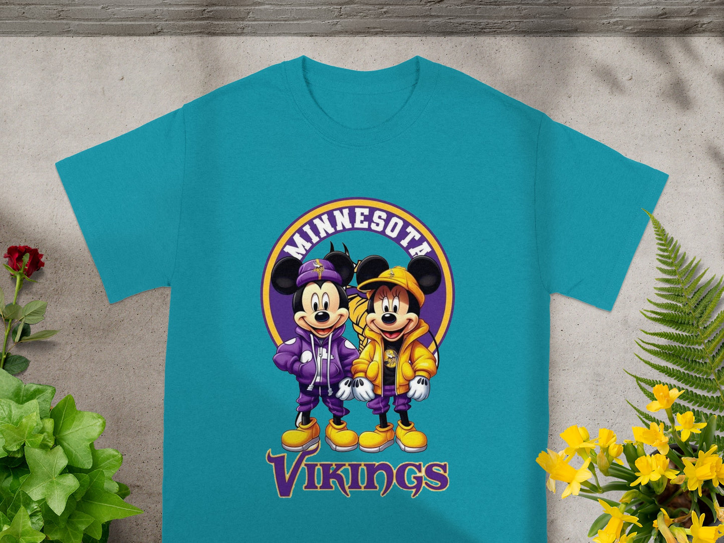 Mickey and Minnie Mouse in Minnesota Vikings jackets and hats.