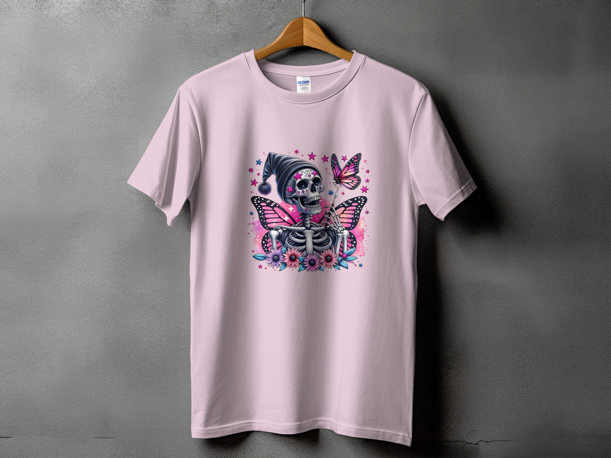 Pink t-shirt with skeleton, butterfly, flowers, and stars graphic.