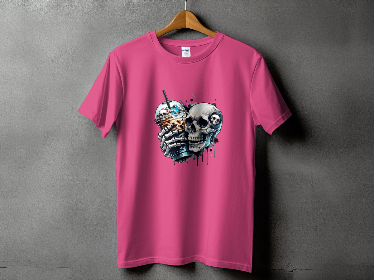 Pink t-shirt with a graphic of a skeleton holding a coffee drink and a skull.