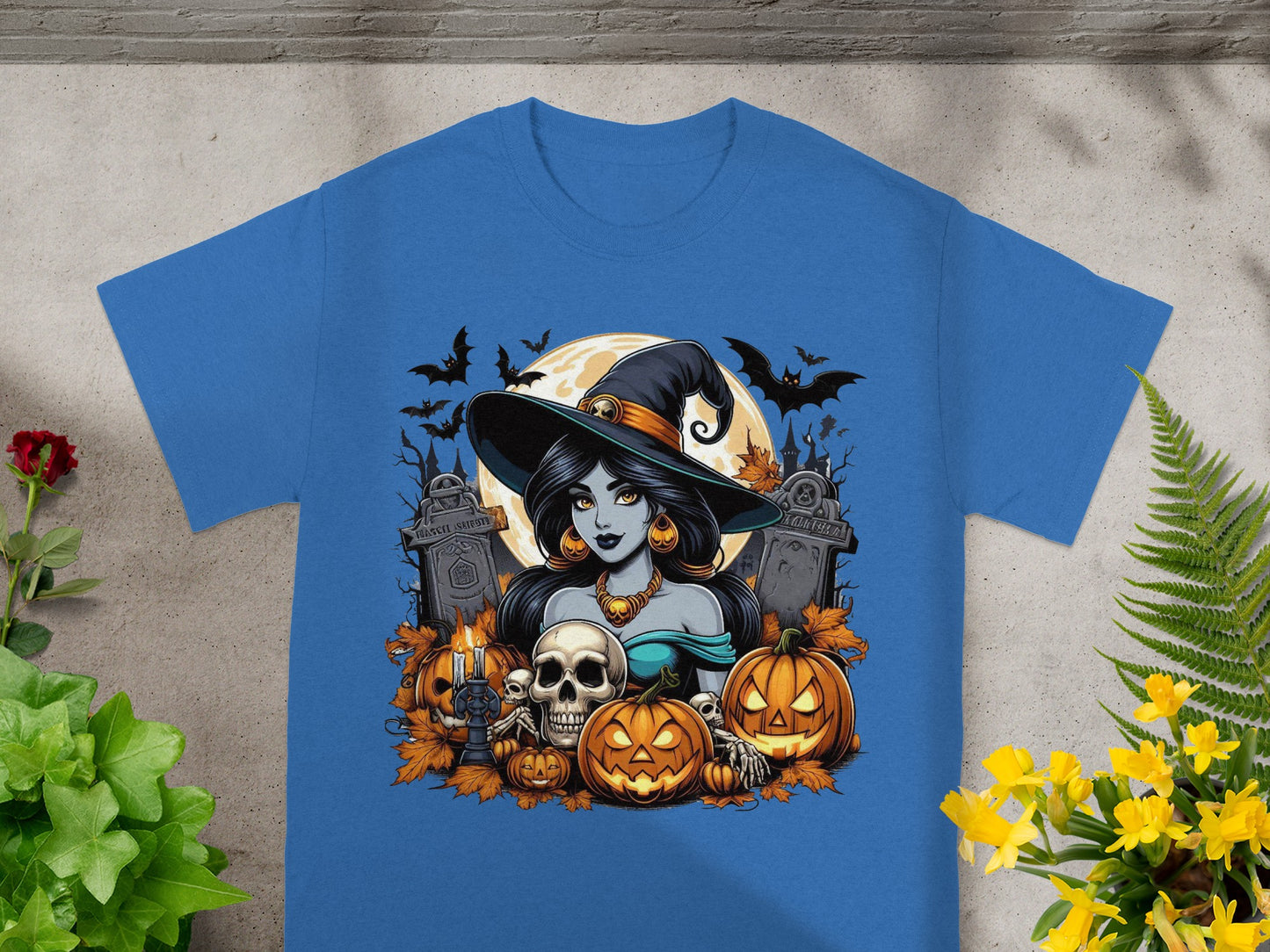 Halloween graphic of a witch with pumpkins, skulls, gravestones, and bats.