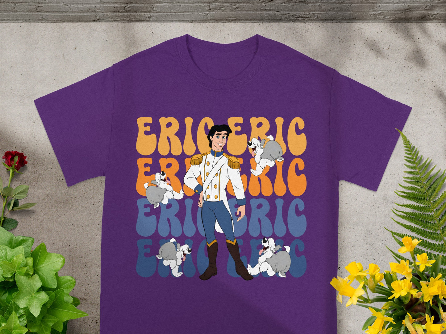 Purple t-shirt with Prince Eric and dogs, text reads "Eric Eric Eric".