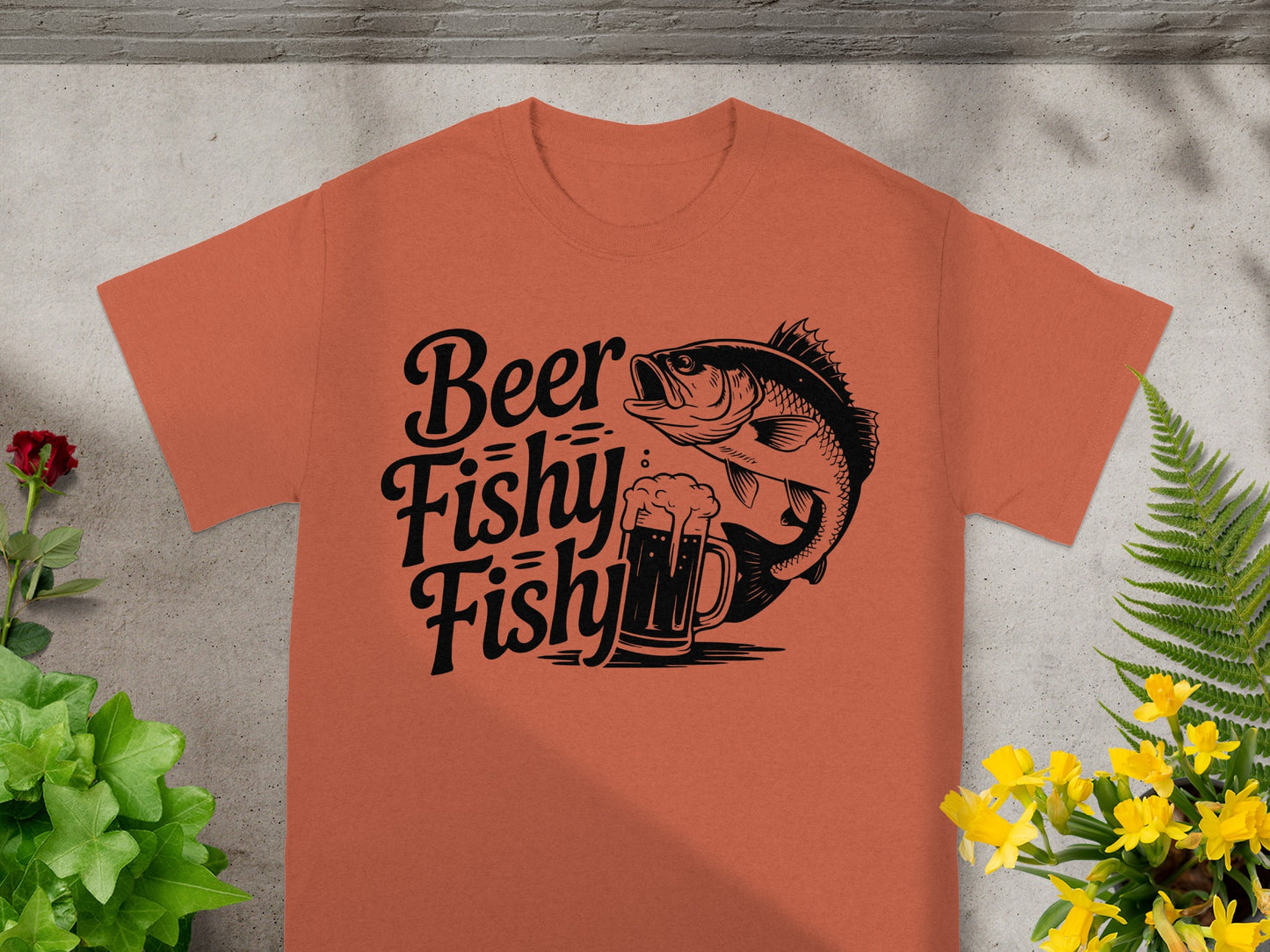 Orange t-shirt with black graphic of fish and beer mug, says "Beer Fishy Fishy".