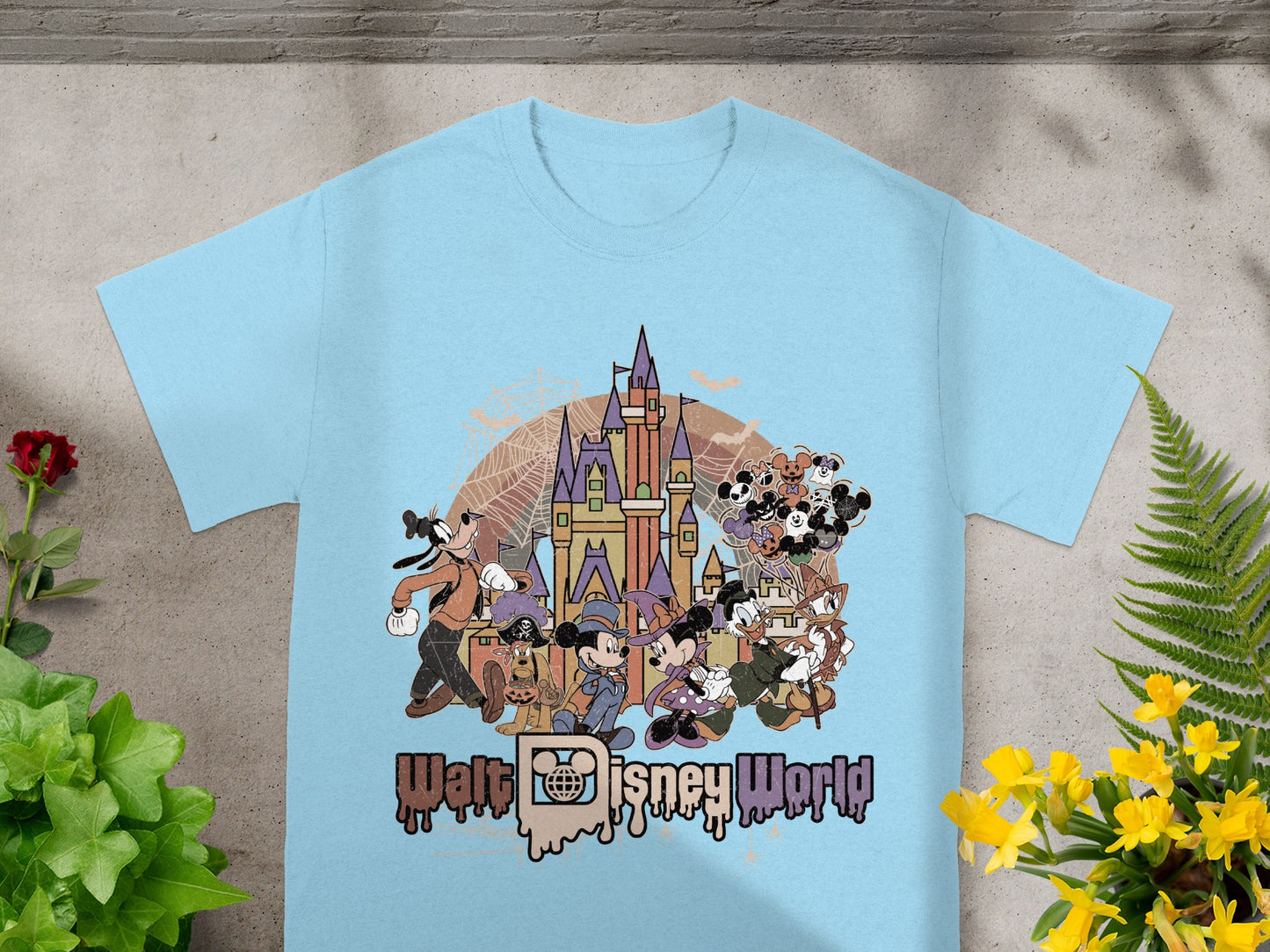 Light blue t-shirt with Disney characters and Walt Disney World text graphic.