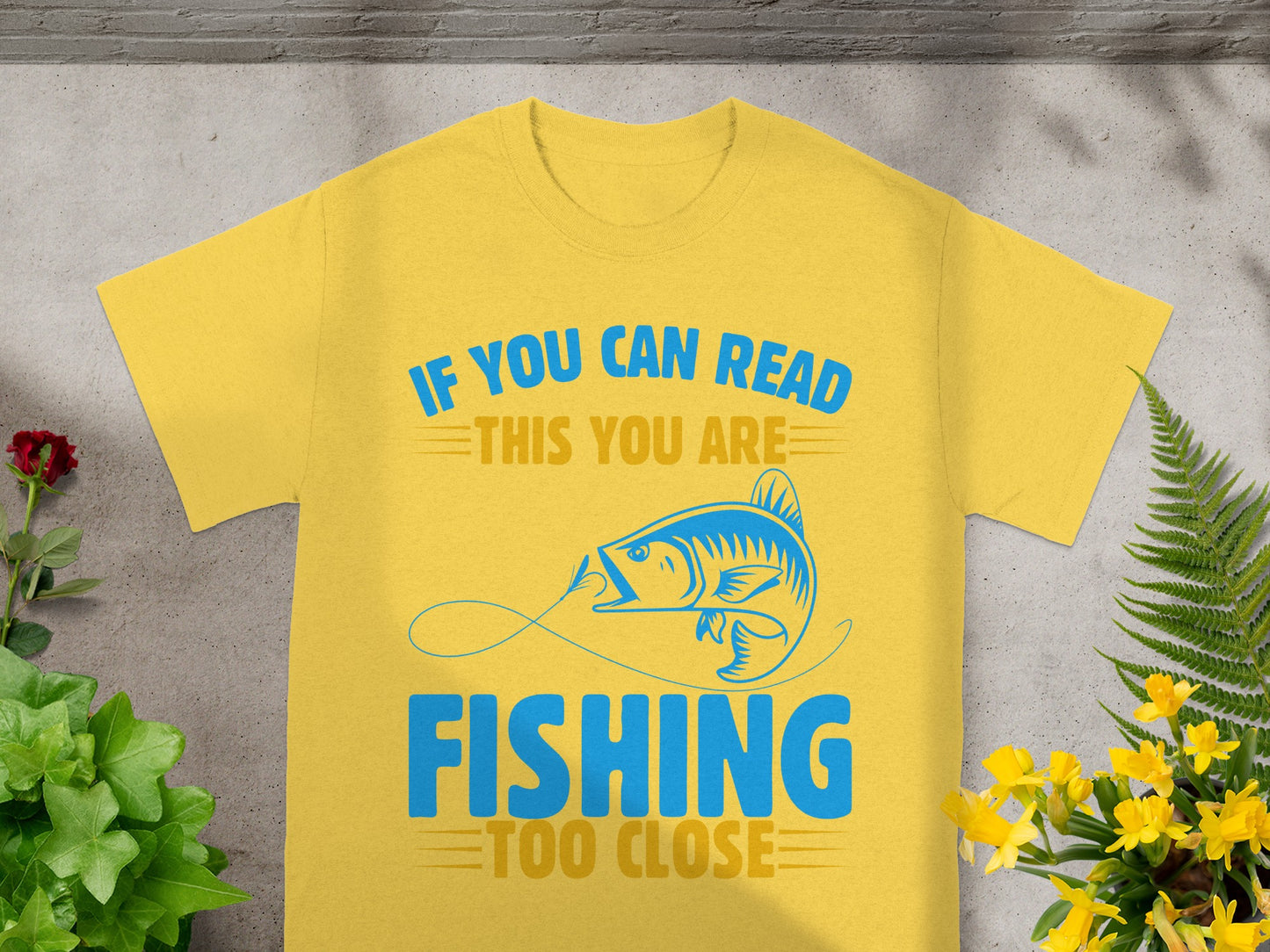 Yellow t-shirt with blue text "IF YOU CAN READ THIS YOU ARE FISHING TOO CLOSE".