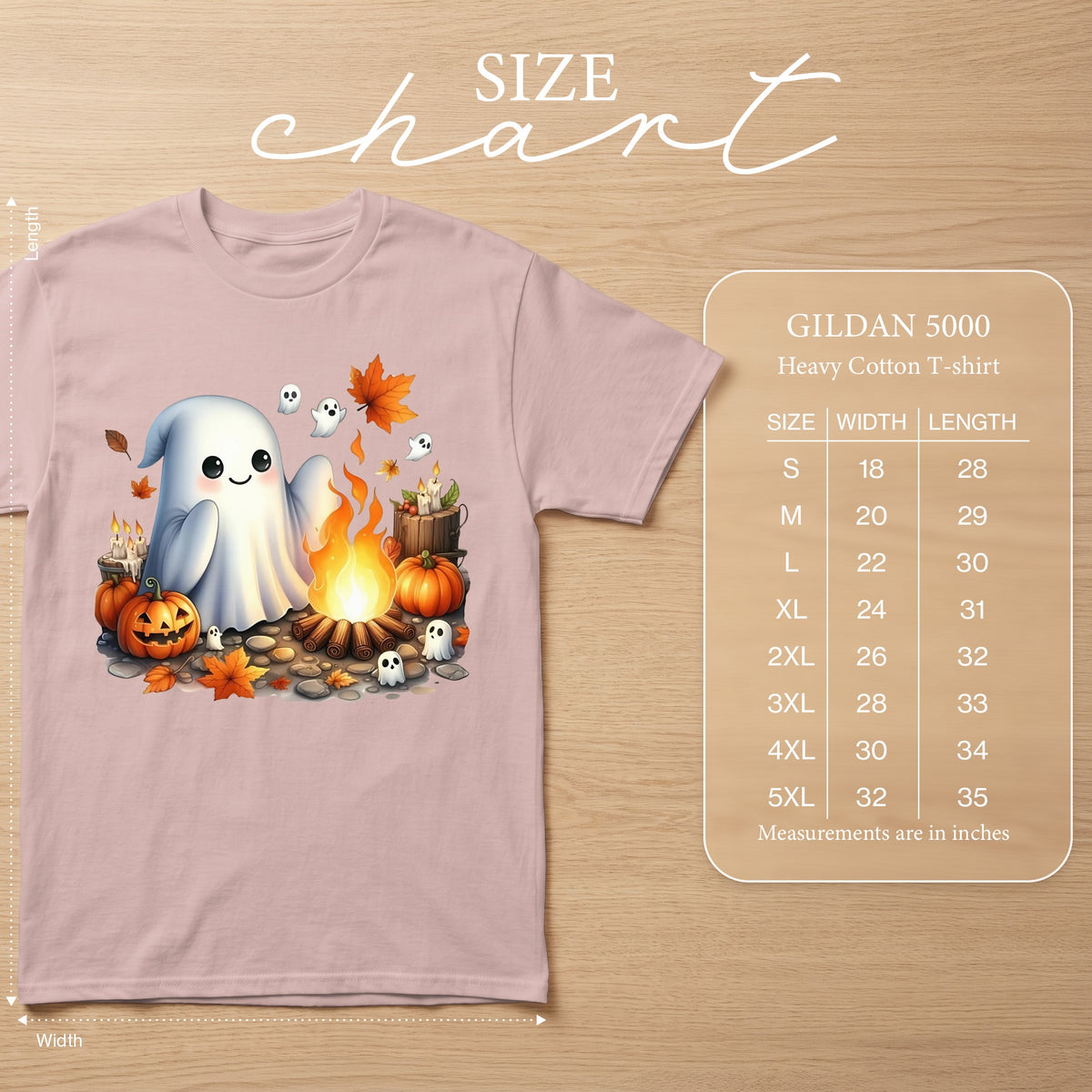 Pink t-shirt with ghost, pumpkins, campfire, and leaves graphic, with size chart.