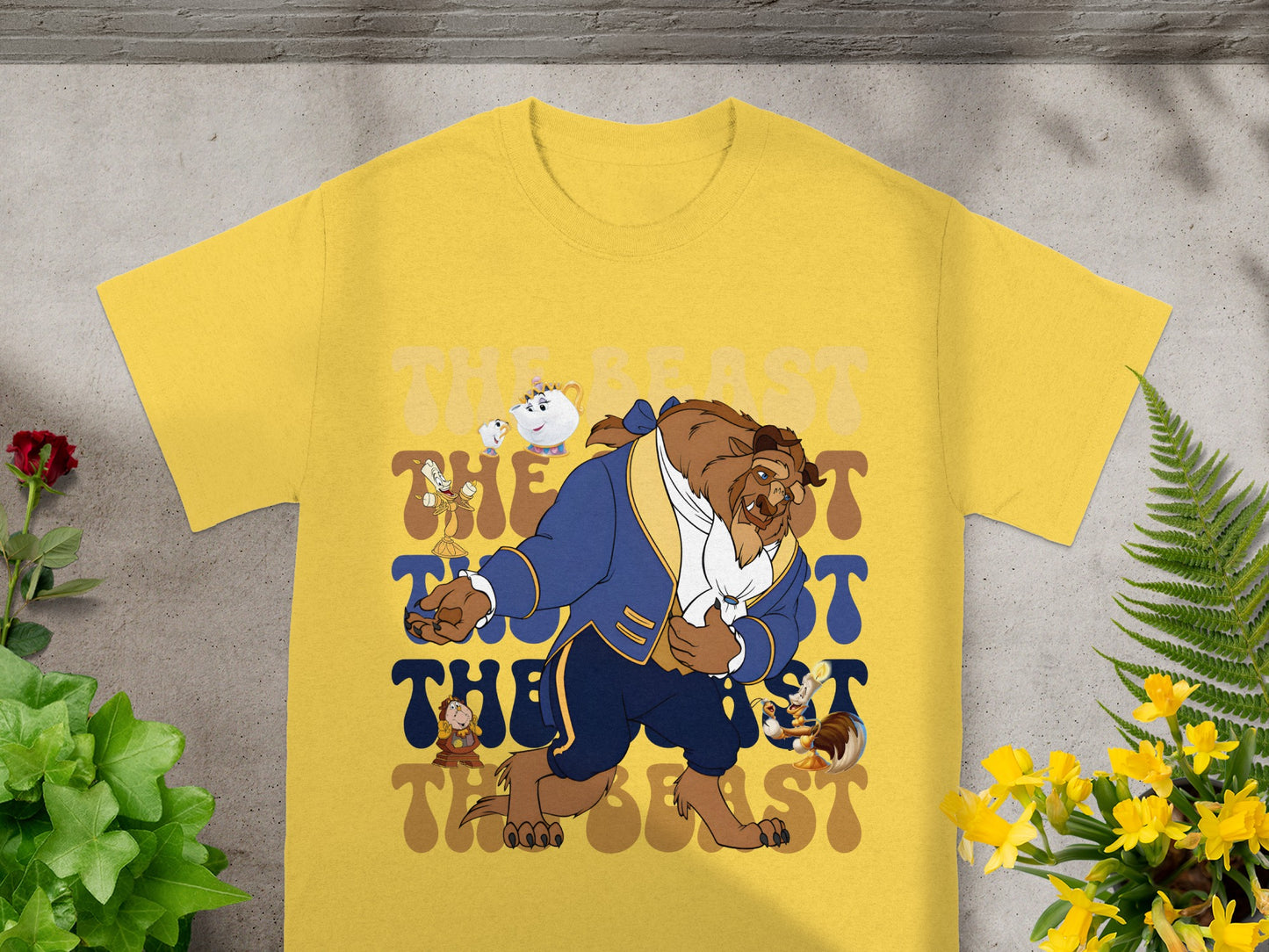 Yellow t-shirt with "The Beast" text and character graphic.