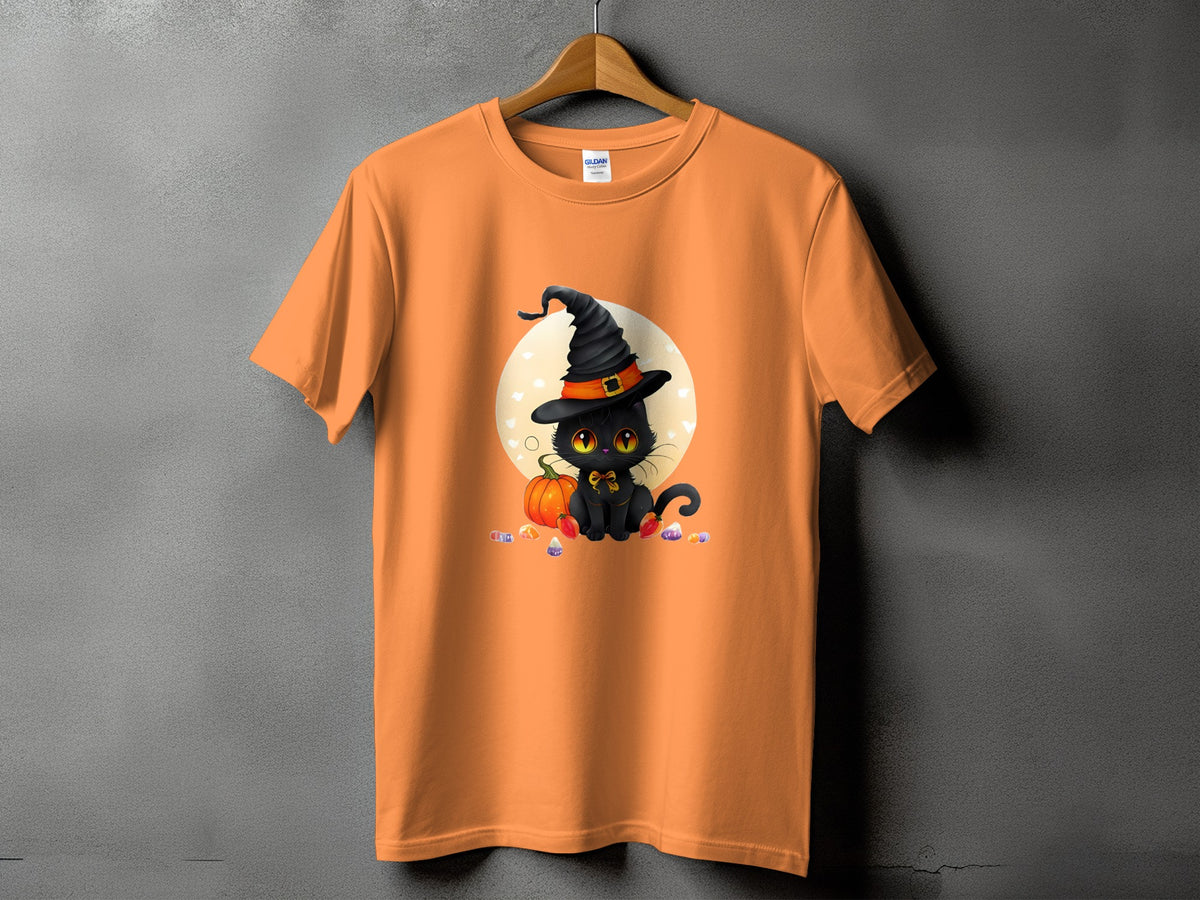 Orange t-shirt featuring a black cat wearing a witch hat and sitting near a pumpkin and candy.