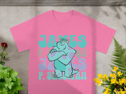 Monsters Inc. character Sulley on a pink t-shirt with "JAMES P. SULLIVAN" text.