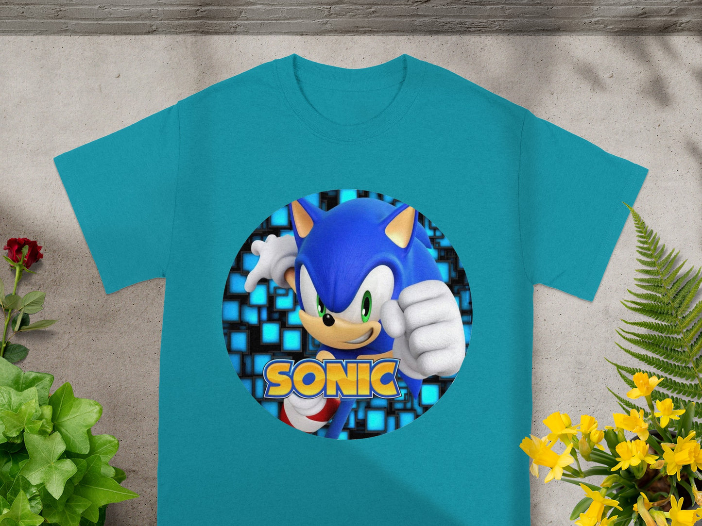 Teal t-shirt featuring Sonic the Hedgehog with a pixelated background.