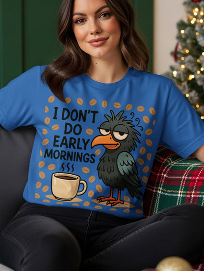 Blue t-shirt with a black bird and coffee cup graphic that reads "I DON'T DO EARLY MORNINGS."