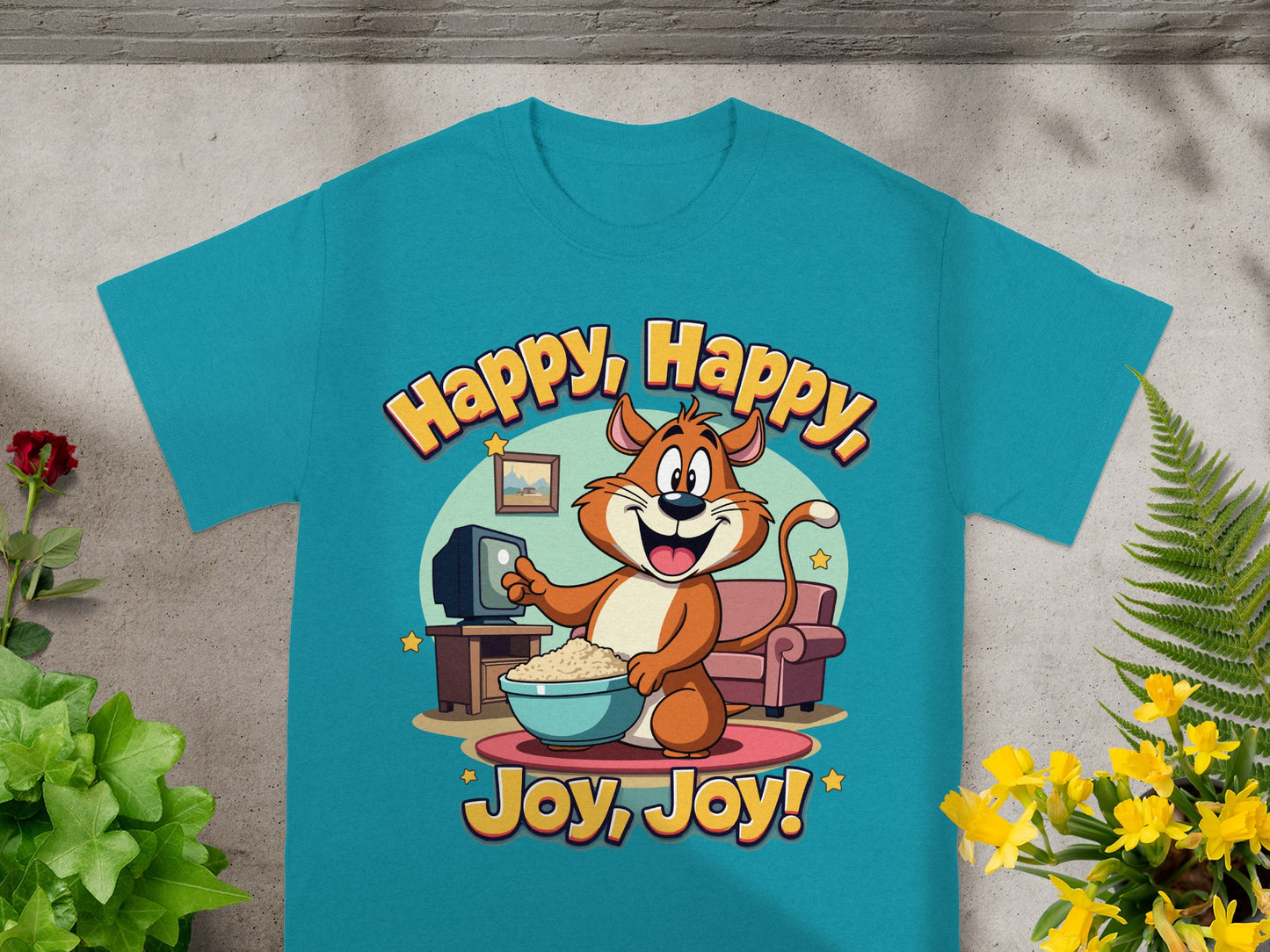 T-shirt with a cartoon cat enjoying popcorn in front of a TV, says "Happy, Happy, Joy, Joy!".