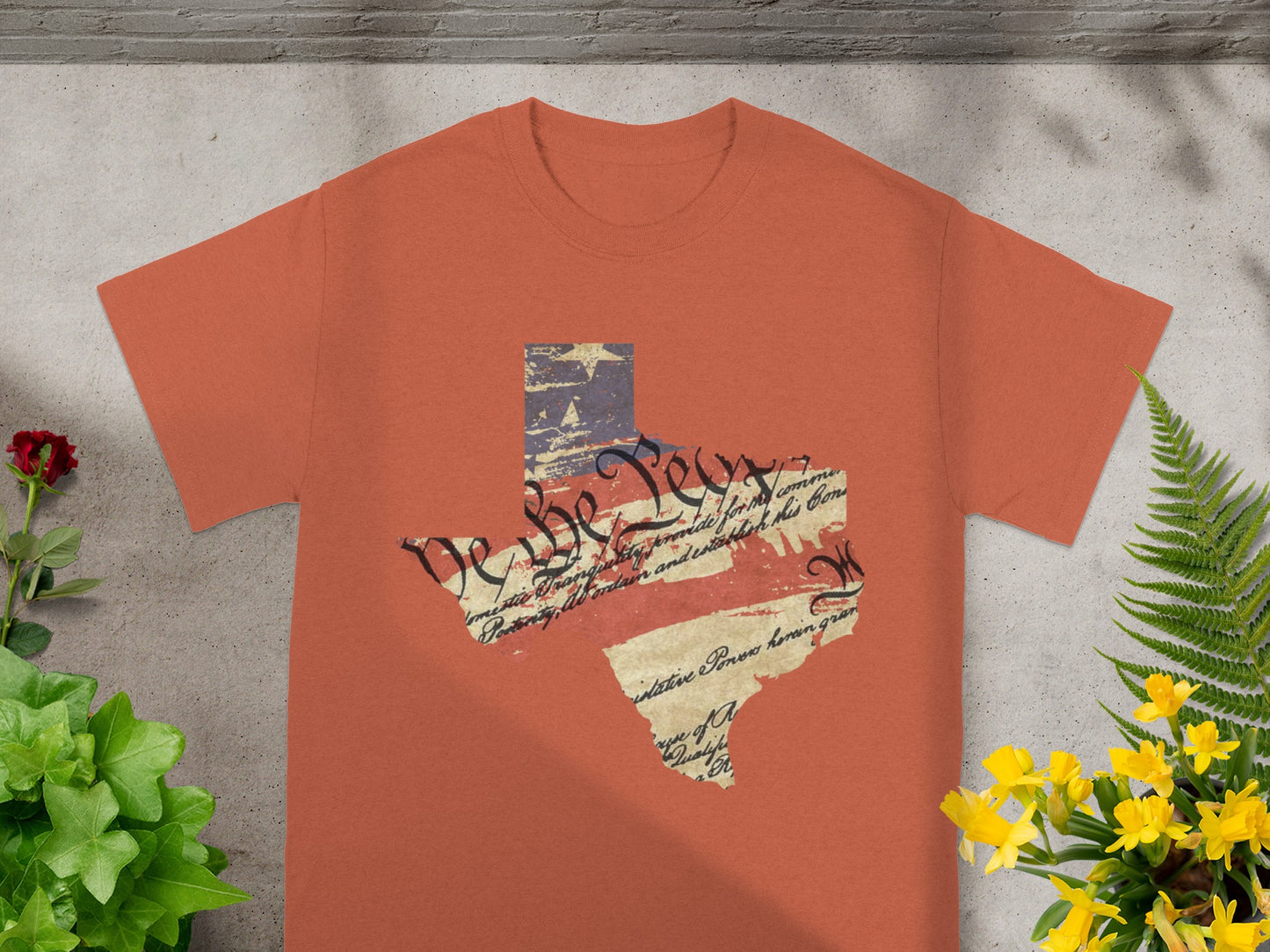 Texas shaped apparel featuring US Constitution text and flag elements.