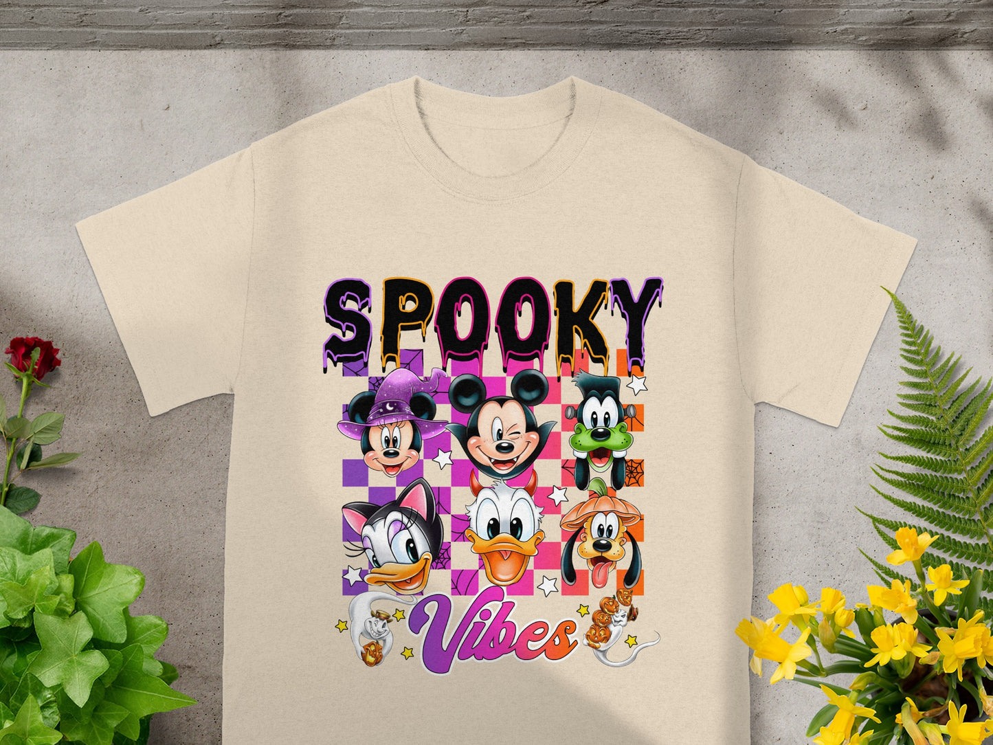 Cream t-shirt with "SPOOKY Vibes" and Halloween-themed Disney characters.