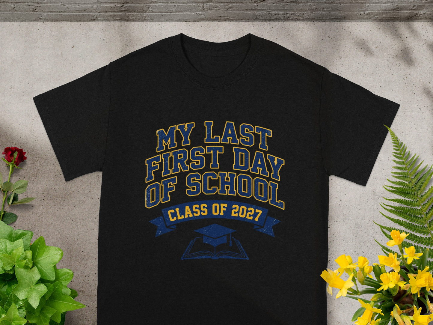 Black t-shirt with "My Last First Day of School" and "Class of 2027" text.