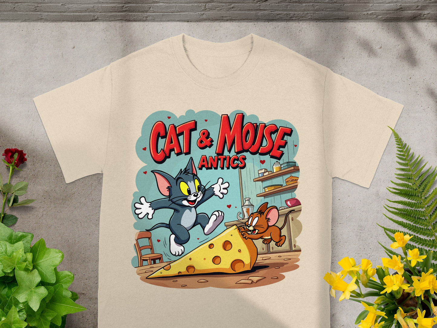 Tom and Jerry chasing cheese on a cream t-shirt.