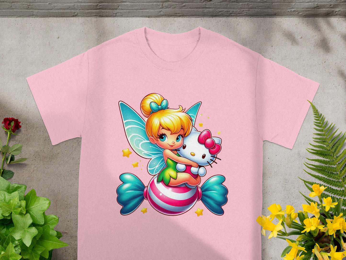 Fairy holding Hello Kitty on a pink candy striped t-shirt.