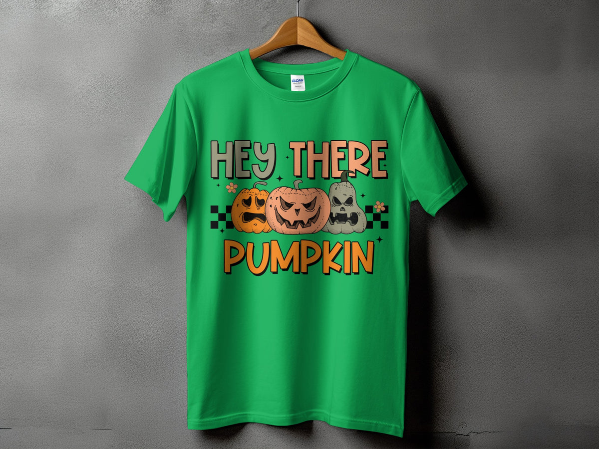 Green t-shirt with "Hey There Pumpkin" and three carved pumpkins.