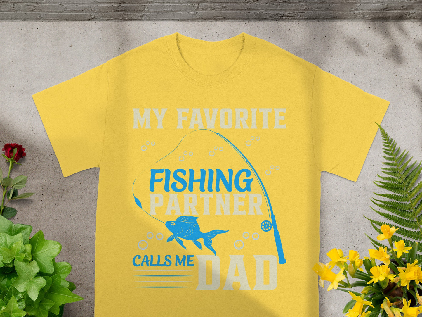 Yellow t-shirt with "MY FAVORITE FISHING PARTNER CALLS ME DAD" text.