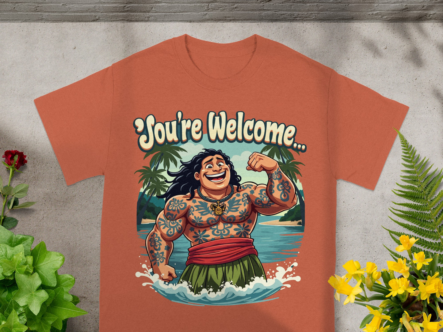 Tattooed man with "You're Welcome..." text on an orange shirt.