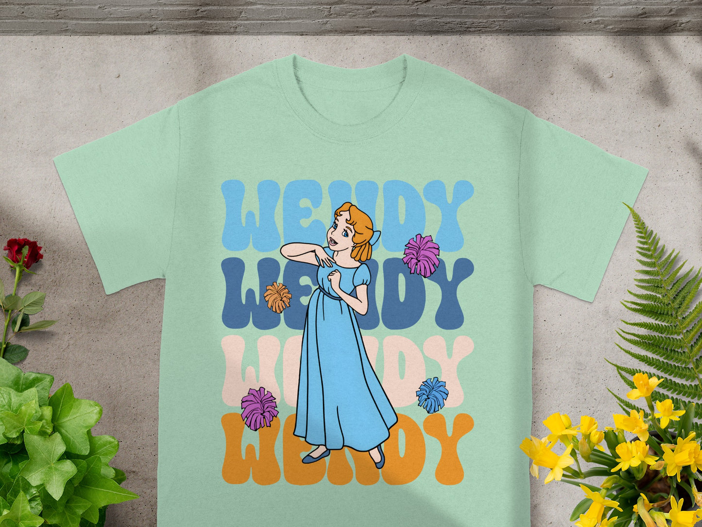 Light mint t-shirt with "Wendy Wendy Wendy" text and character illustration.