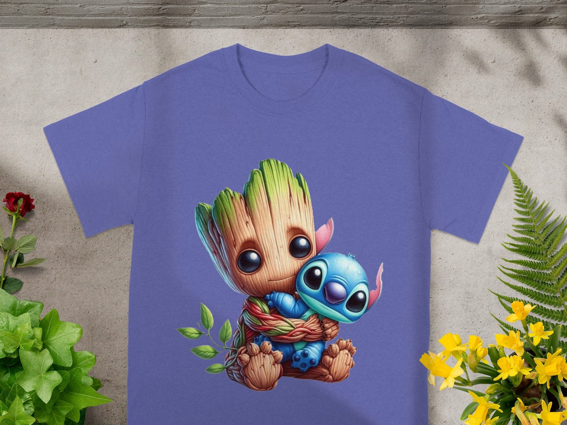 Groot hugging Stitch, design on a purple t-shirt.