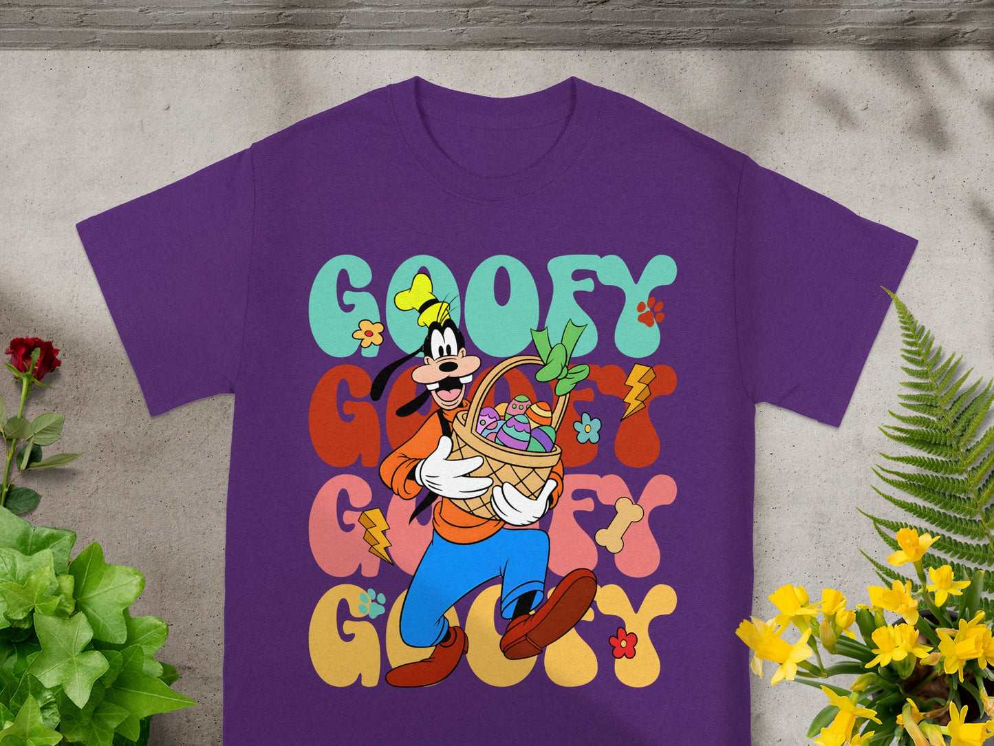Goofy wearing a purple t-shirt carrying an Easter basket.