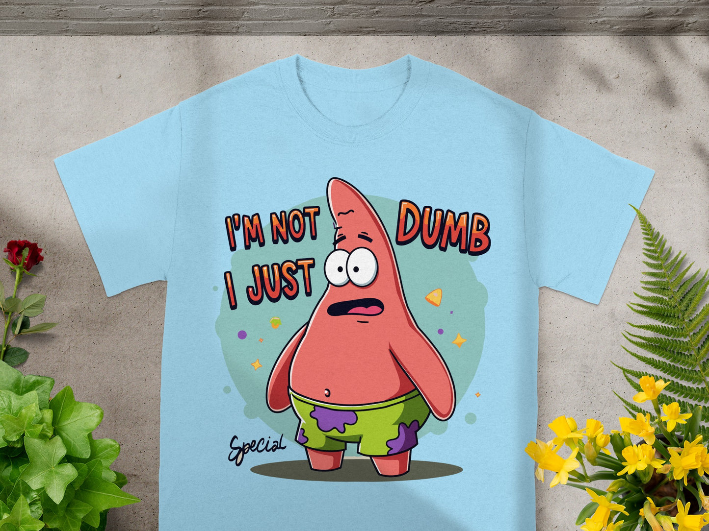 Light blue t-shirt with Patrick Star saying "I'm not dumb, I'm special".