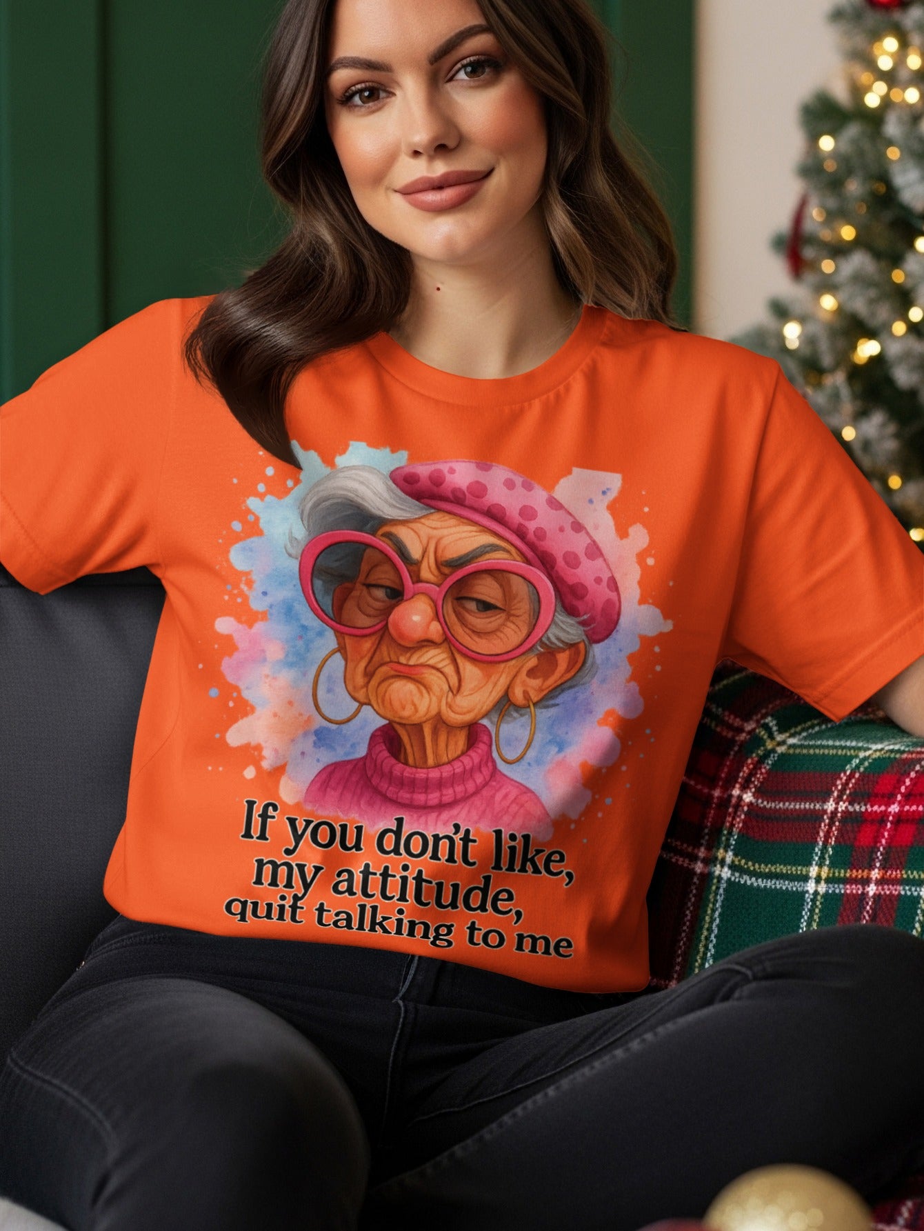 Orange t-shirt with cartoon of grumpy older woman saying "if you don't like, my attitude, quit talking to me".