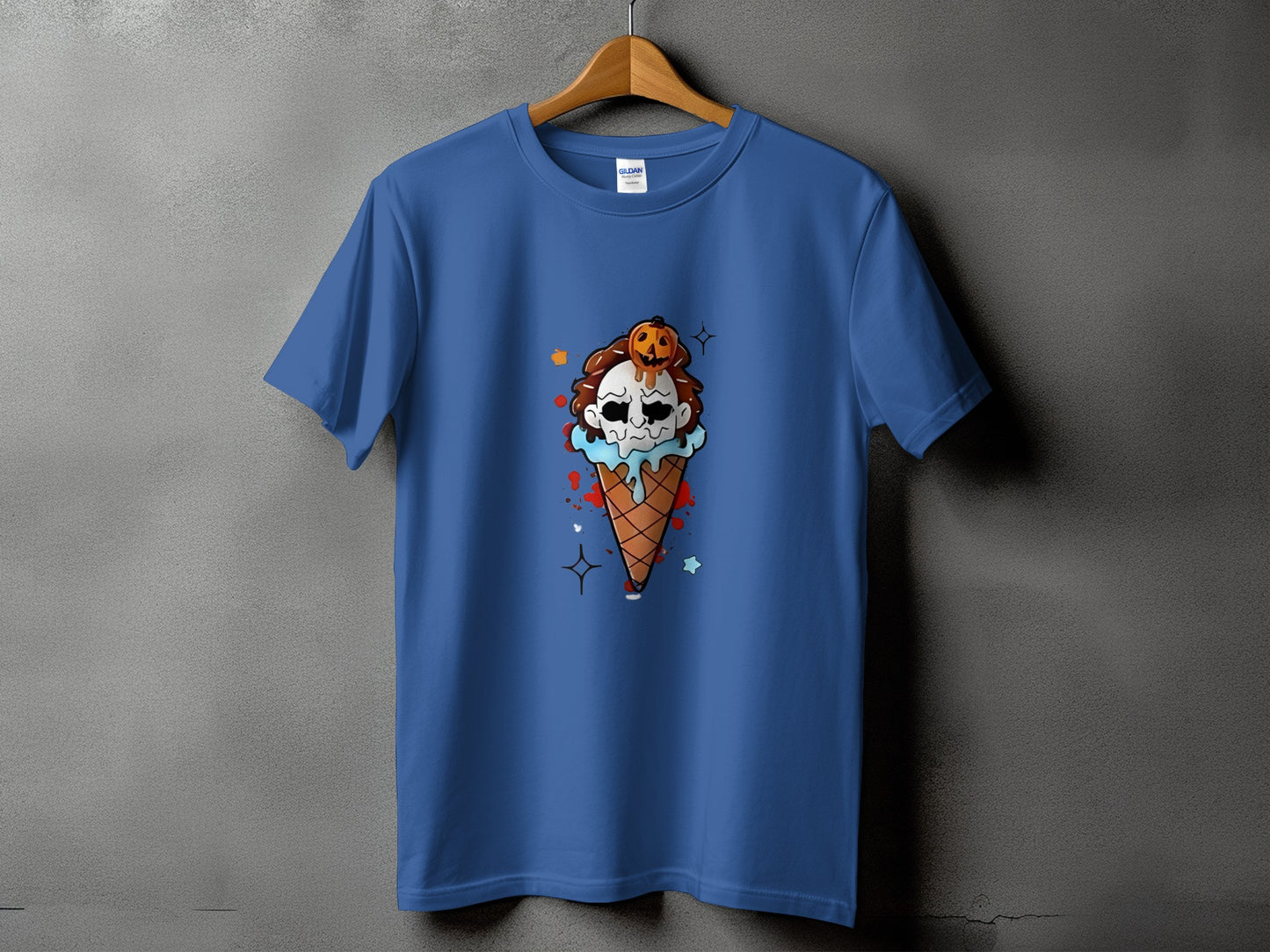 Blue t-shirt with a spooky ice cream cone graphic featuring a skull and pumpkin.