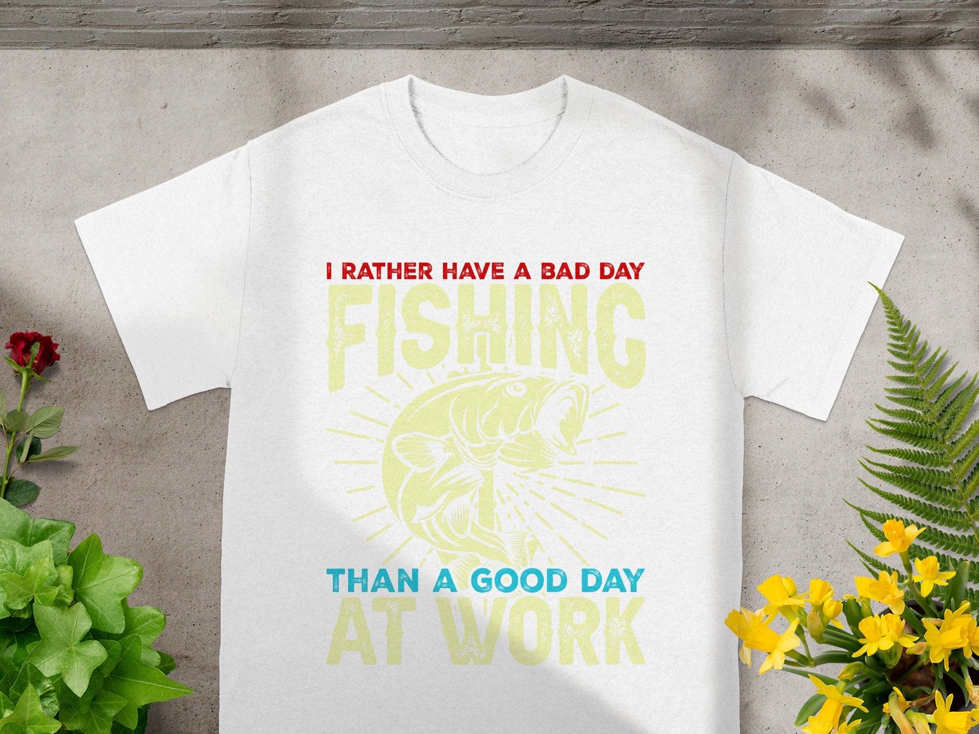 White t-shirt with graphic: "I rather have a bad day fishing than a good day at work".