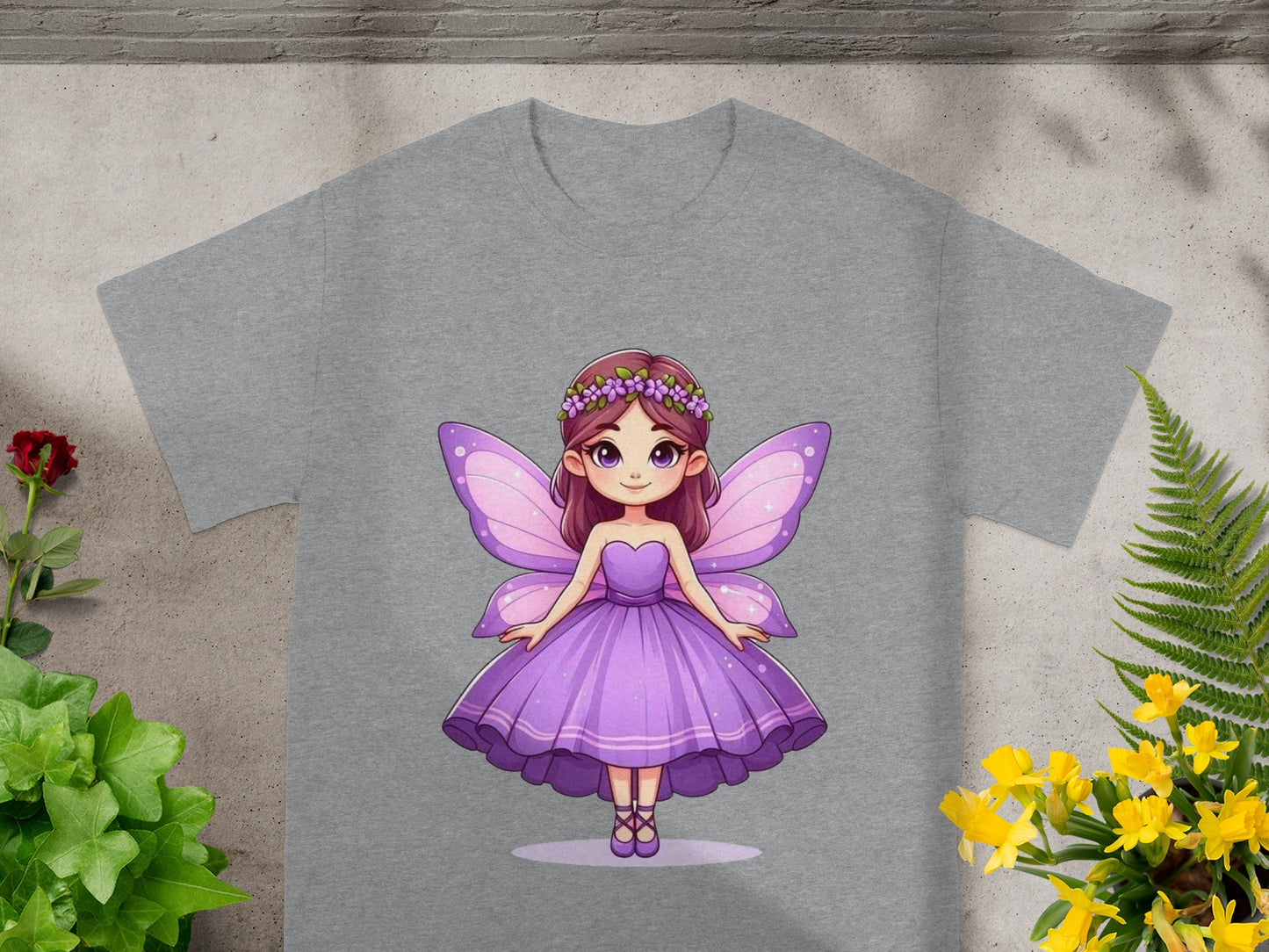 Fairy with purple dress and wings, on a grey t-shirt.