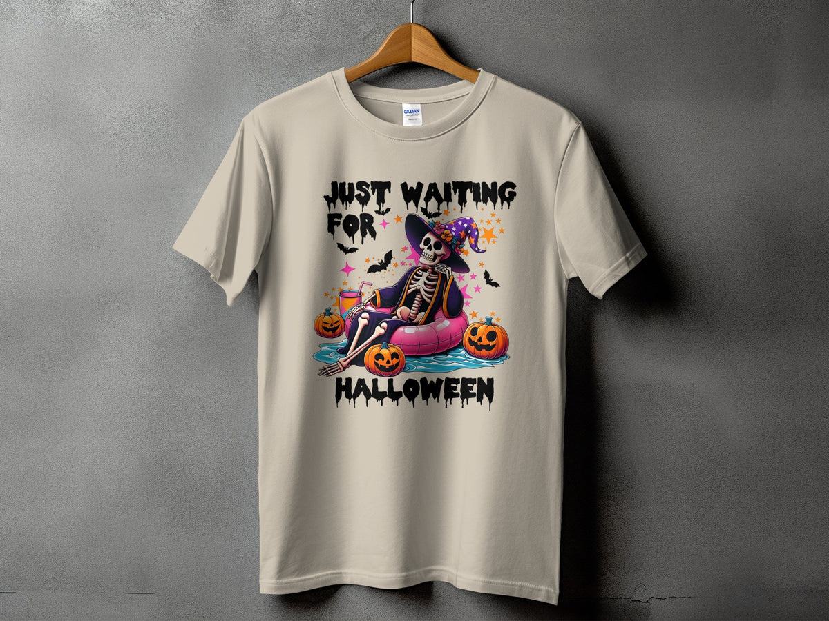 Skeleton floating with pumpkins, text "JUST WAITING FOR HALLOWEEN".