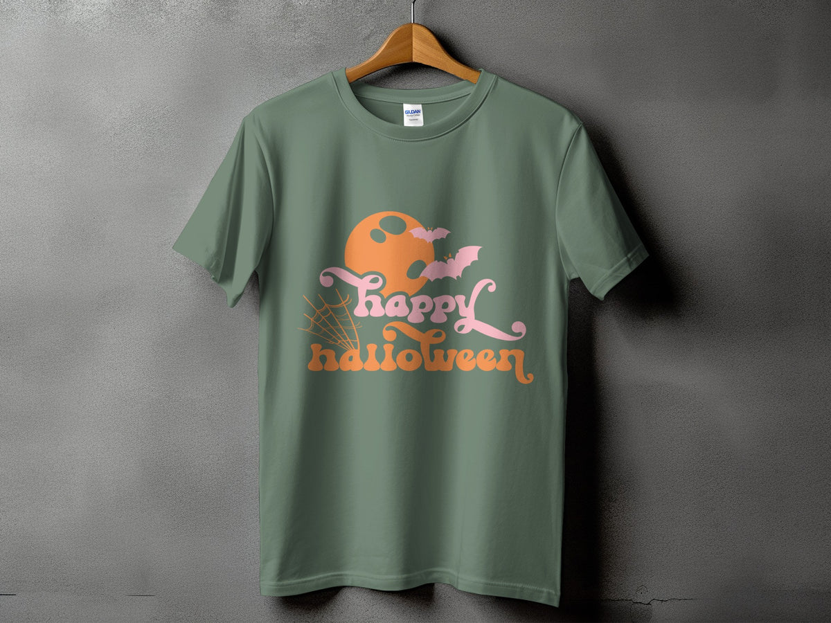 Green t-shirt with a Halloween graphic featuring an orange moon, pink bats, and text.
