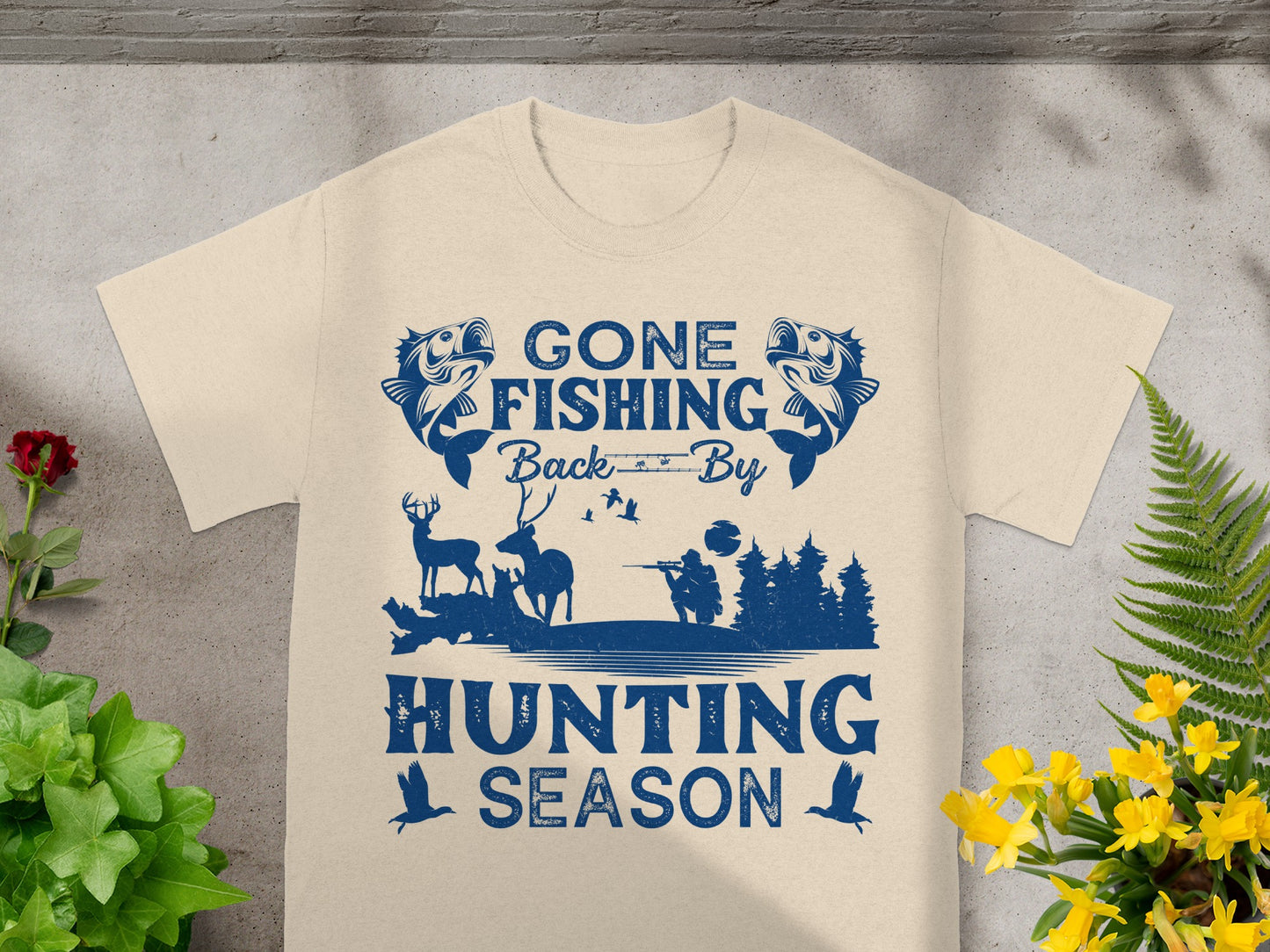 Cream t-shirt with blue graphic: "Gone Fishing, Back By Hunting Season".