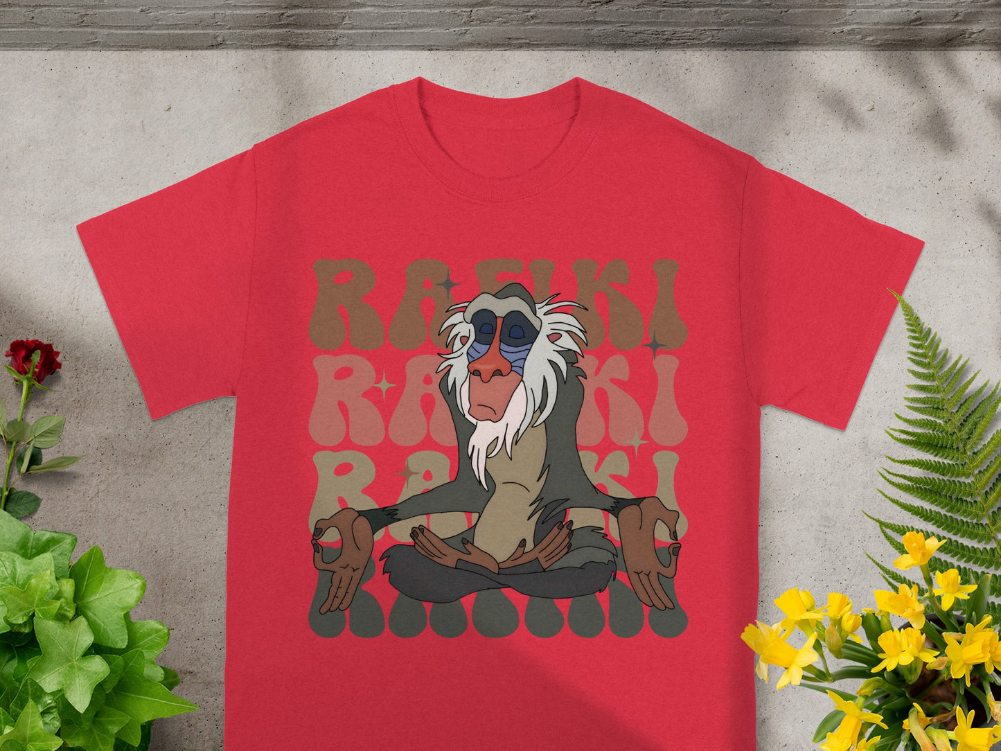 Red t-shirt with Rafiki meditating in a retro font.