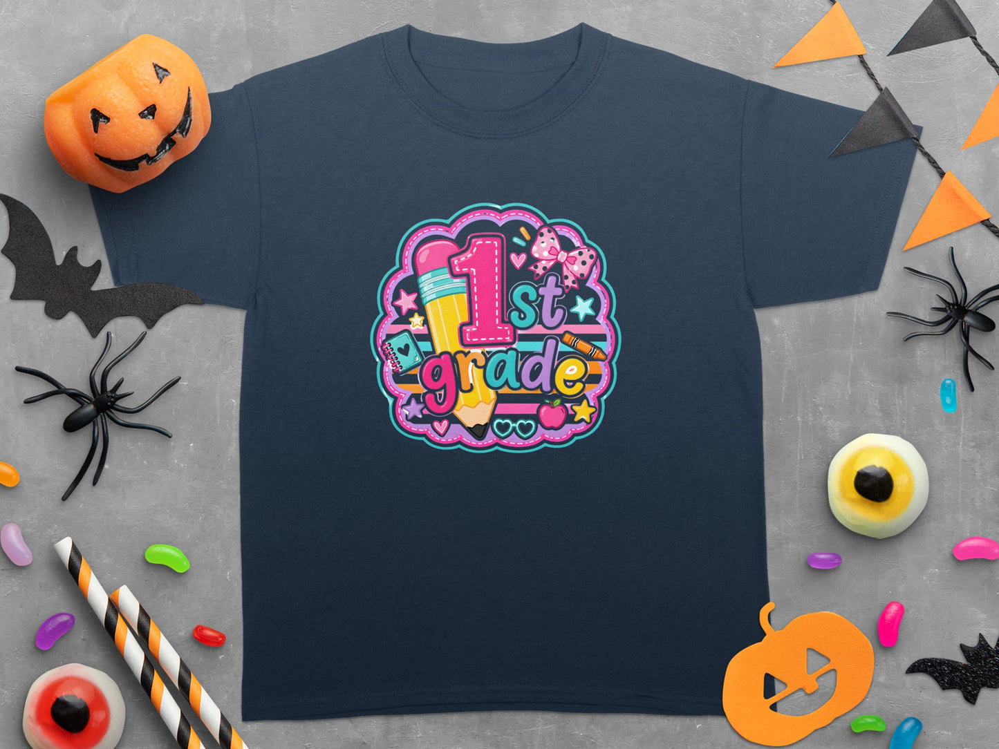 Dark t-shirt with "1st grade" text, pencil, apple, and butterflies graphic.