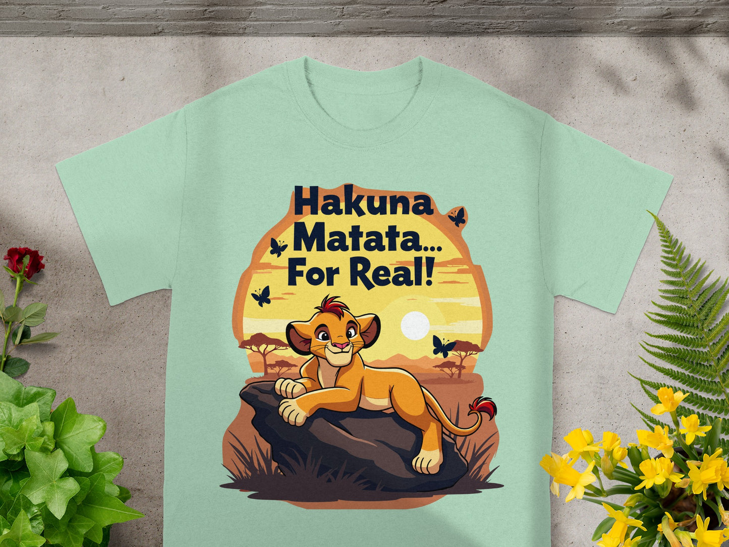 Simba from The Lion King on a rock with "Hakuna Matata... For Real!" text.