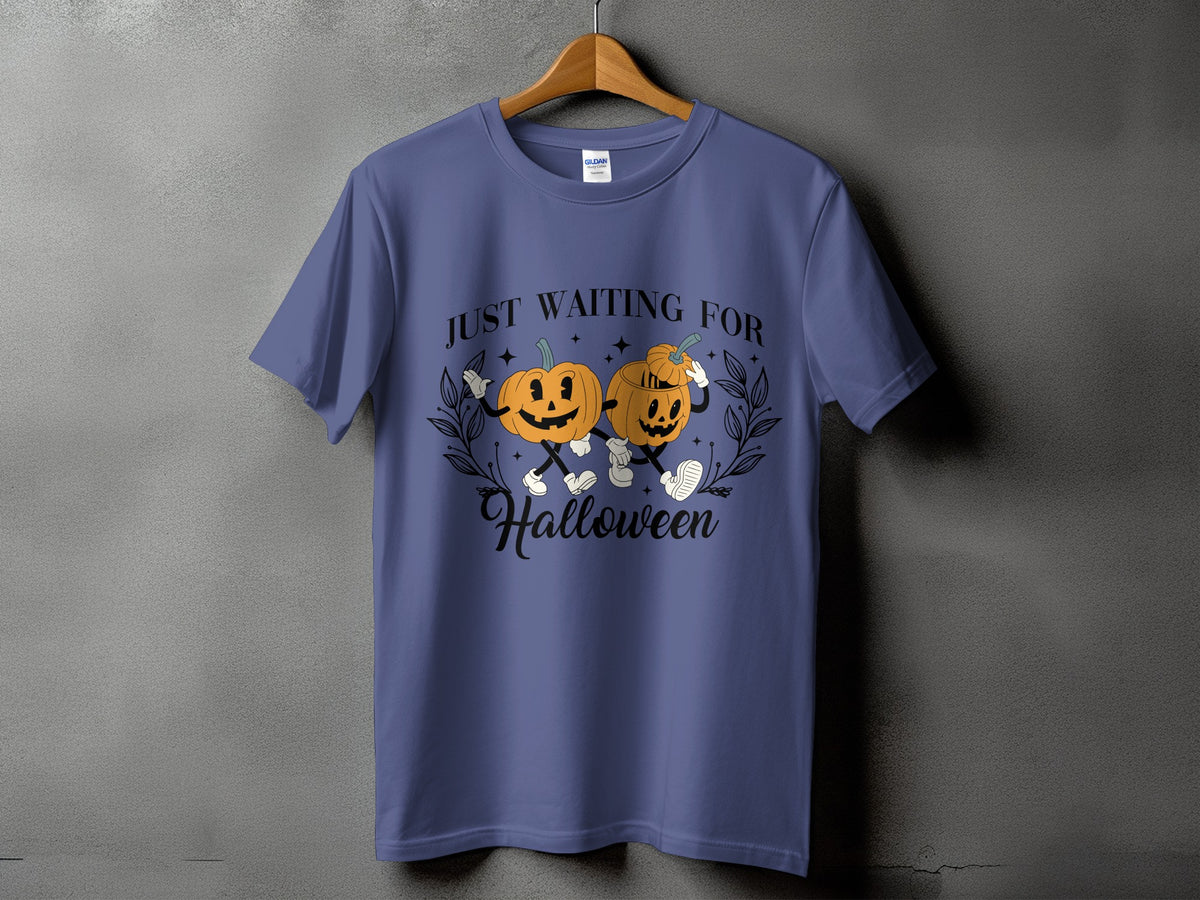 Blue t-shirt with graphic of two pumpkins and text "JUST WAITING FOR Halloween".